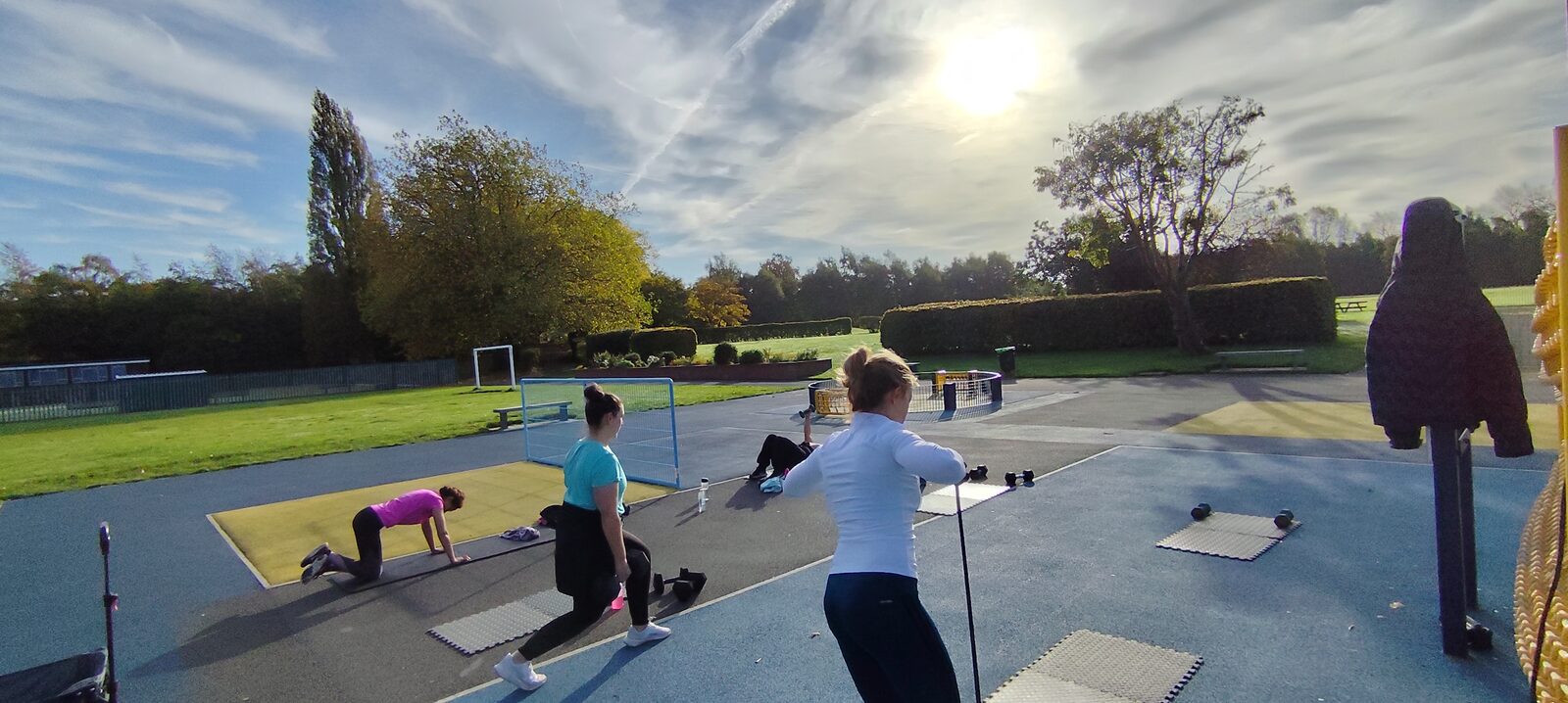 Women's outdoor bootcamp group training session in Ladybarn Park, Withington